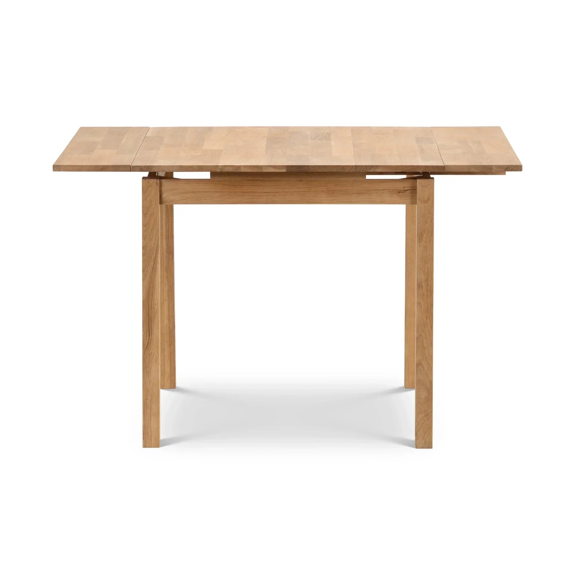 Rectangular oak extending dining table with extended leaves, straight legs, on white background