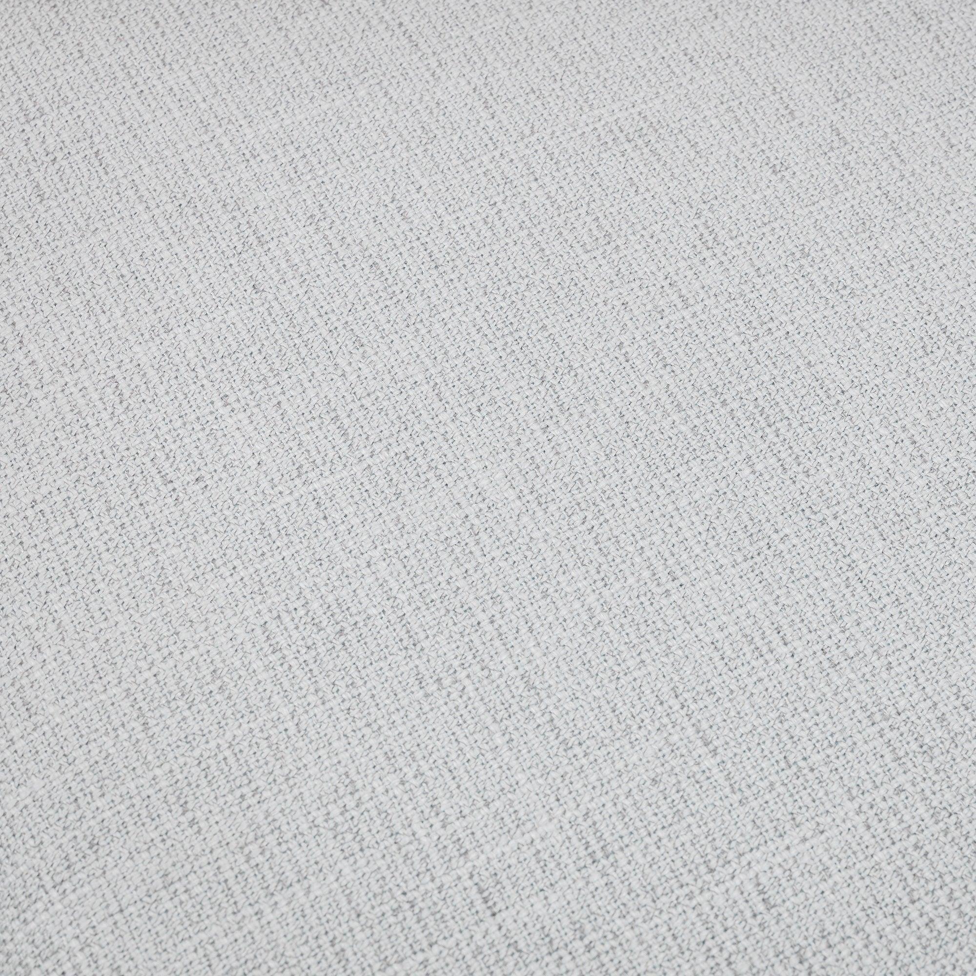 Ivory dining chair fabric close-up showing textured upholstery detail