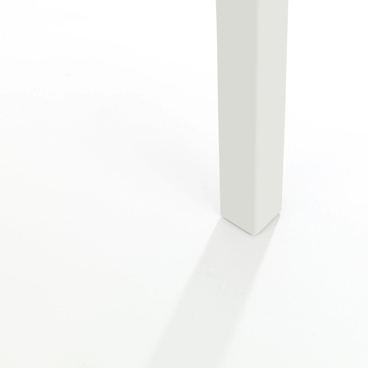 Ivory painted wood table leg from a square dining table on white background