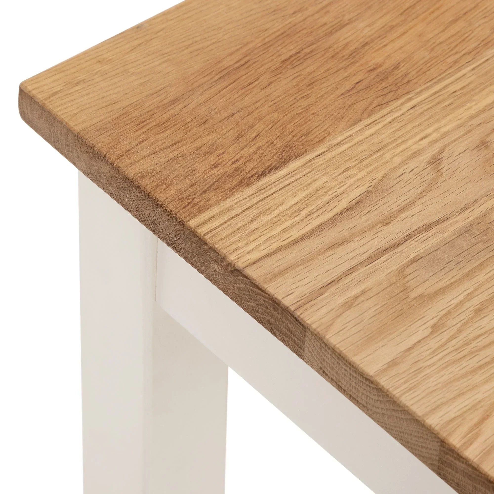oak console table close-up showing ivory painted leg and natural wood grain top