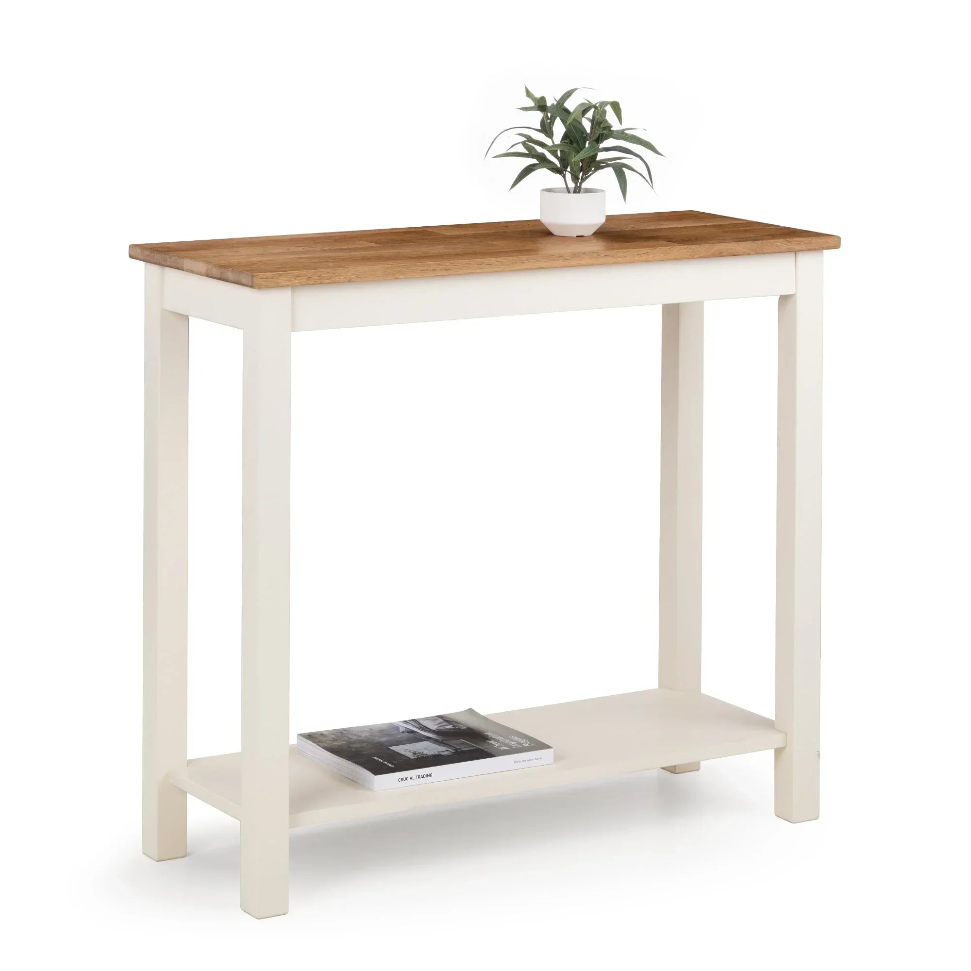 Ivory and oak console table with lower shelf, plant and book styled on top and bottom