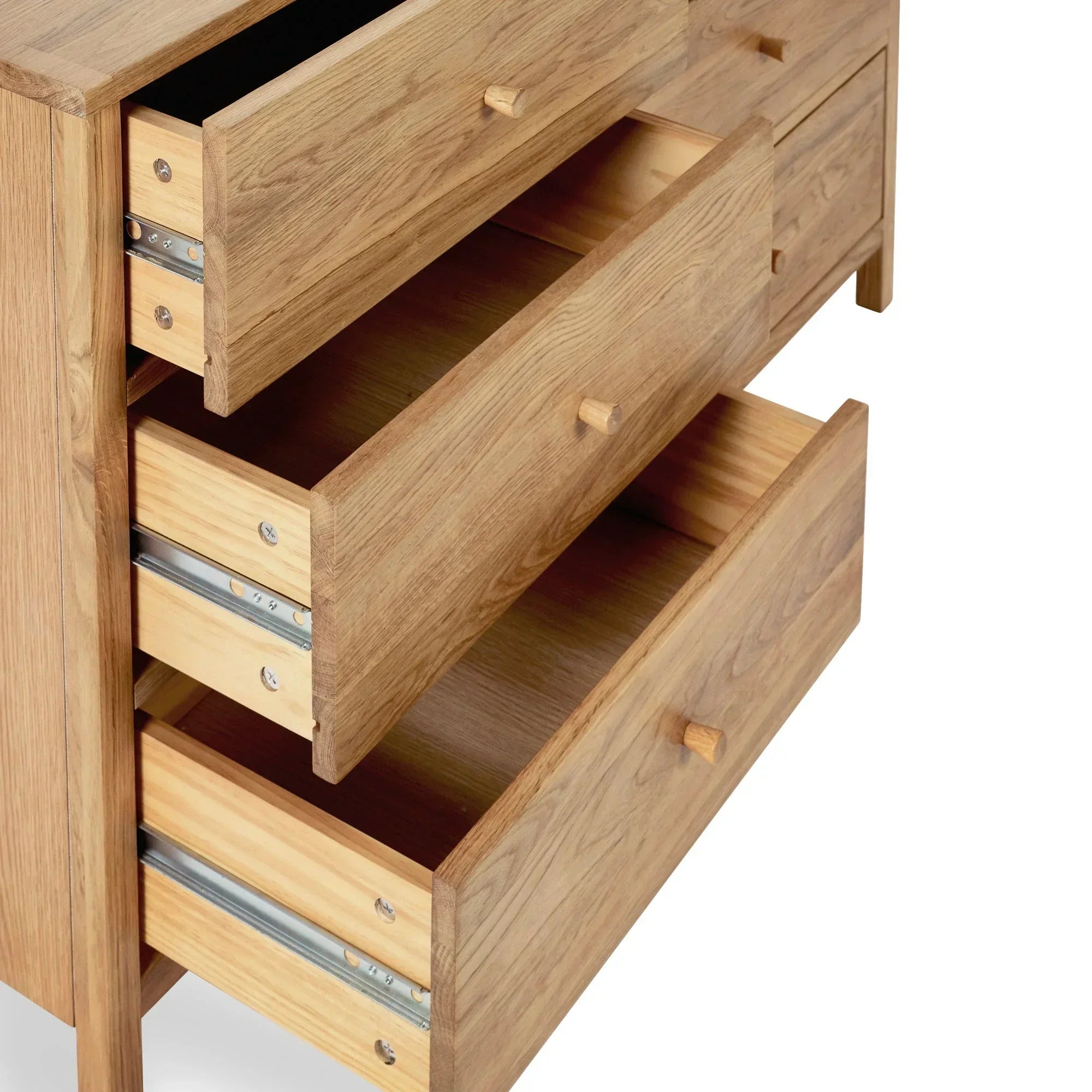 Oak chest of drawers with smooth runners and three open drawers
