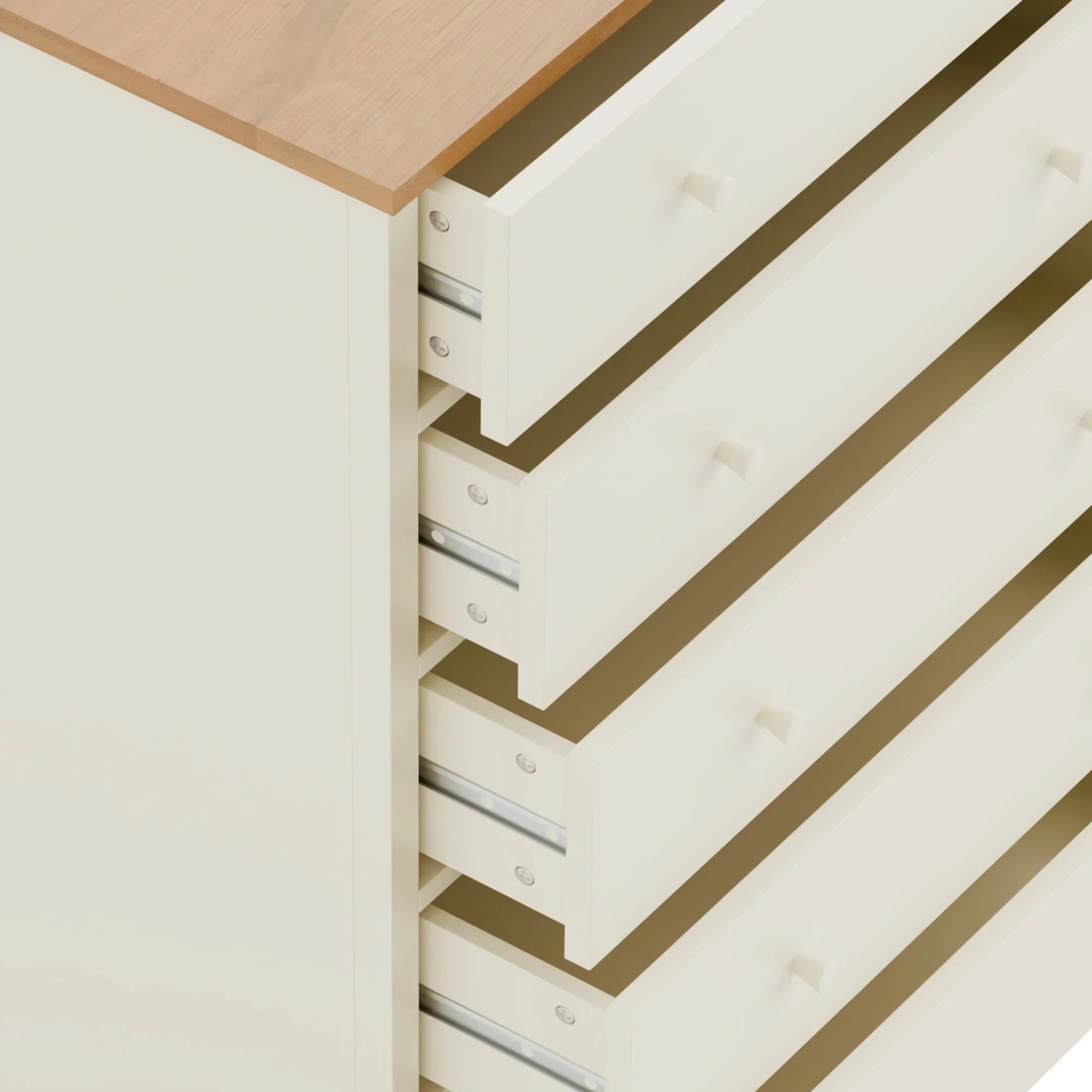 Cream chest of drawers with wooden top and open drawers, viewed from above