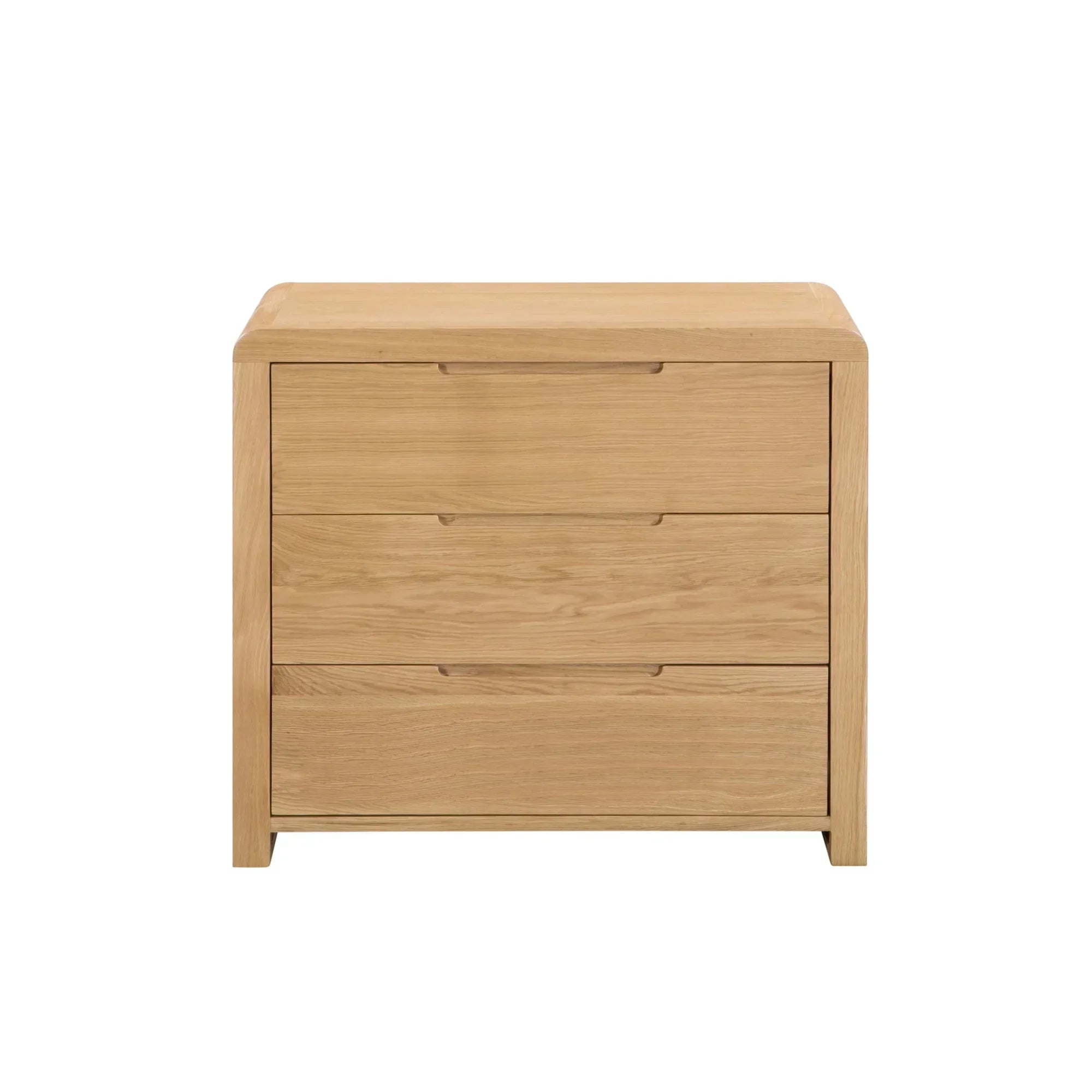 Oak three drawer chest with curved corners and recessed handles, front view