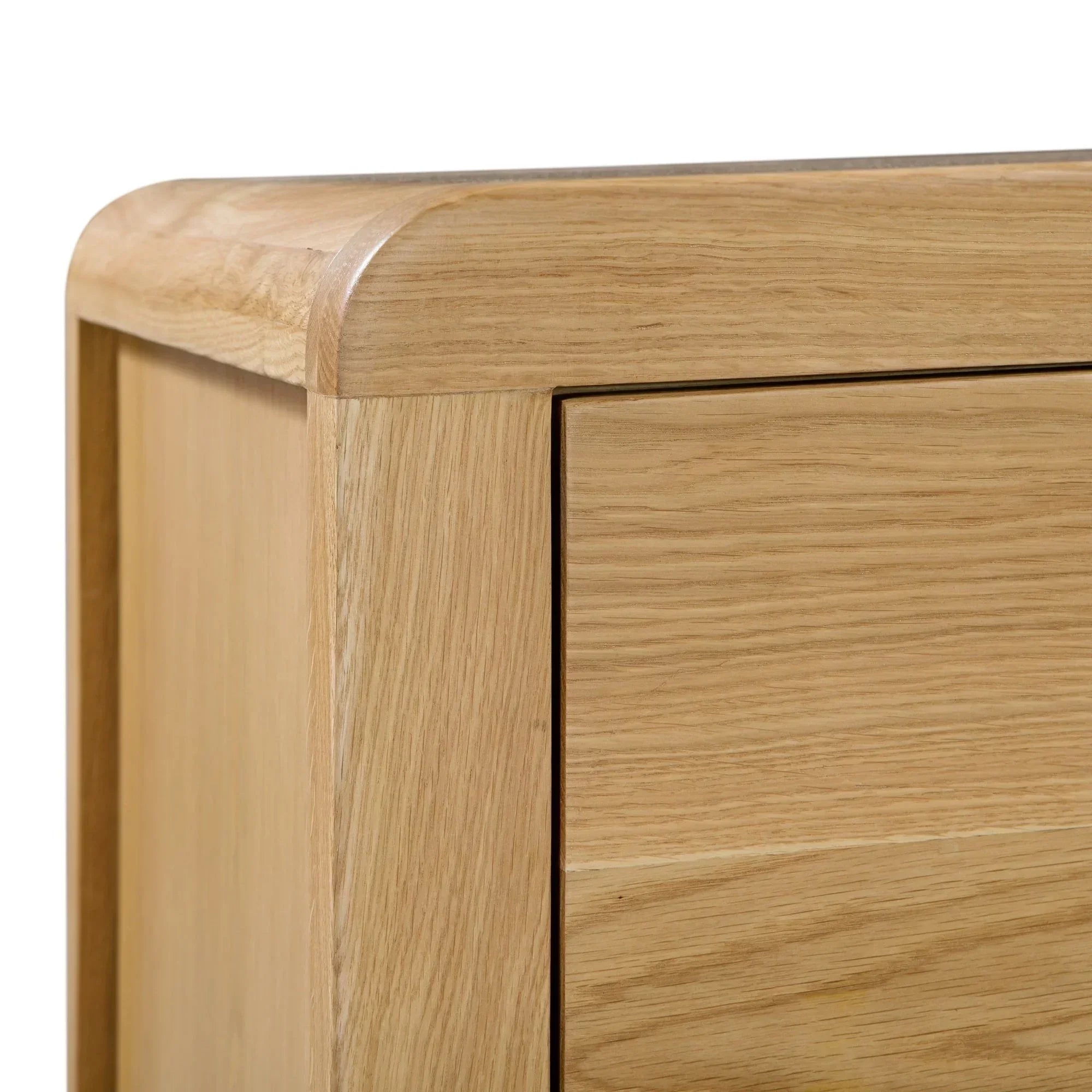 Detail of oak finish on Curve 3 drawer chest with rounded edge and smooth drawer front