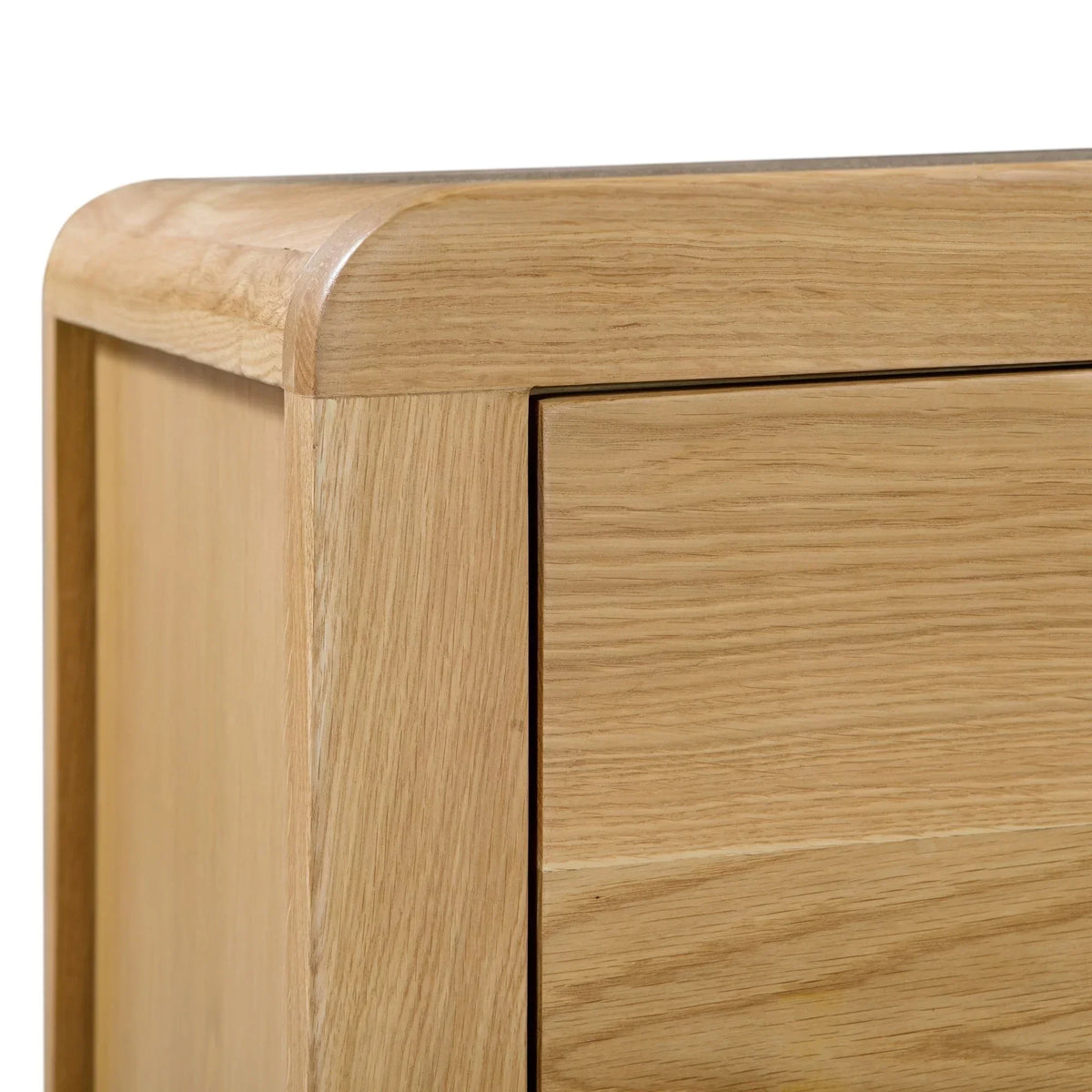 oak 3 drawer chest close-up showing curved corner and wood grain detail
