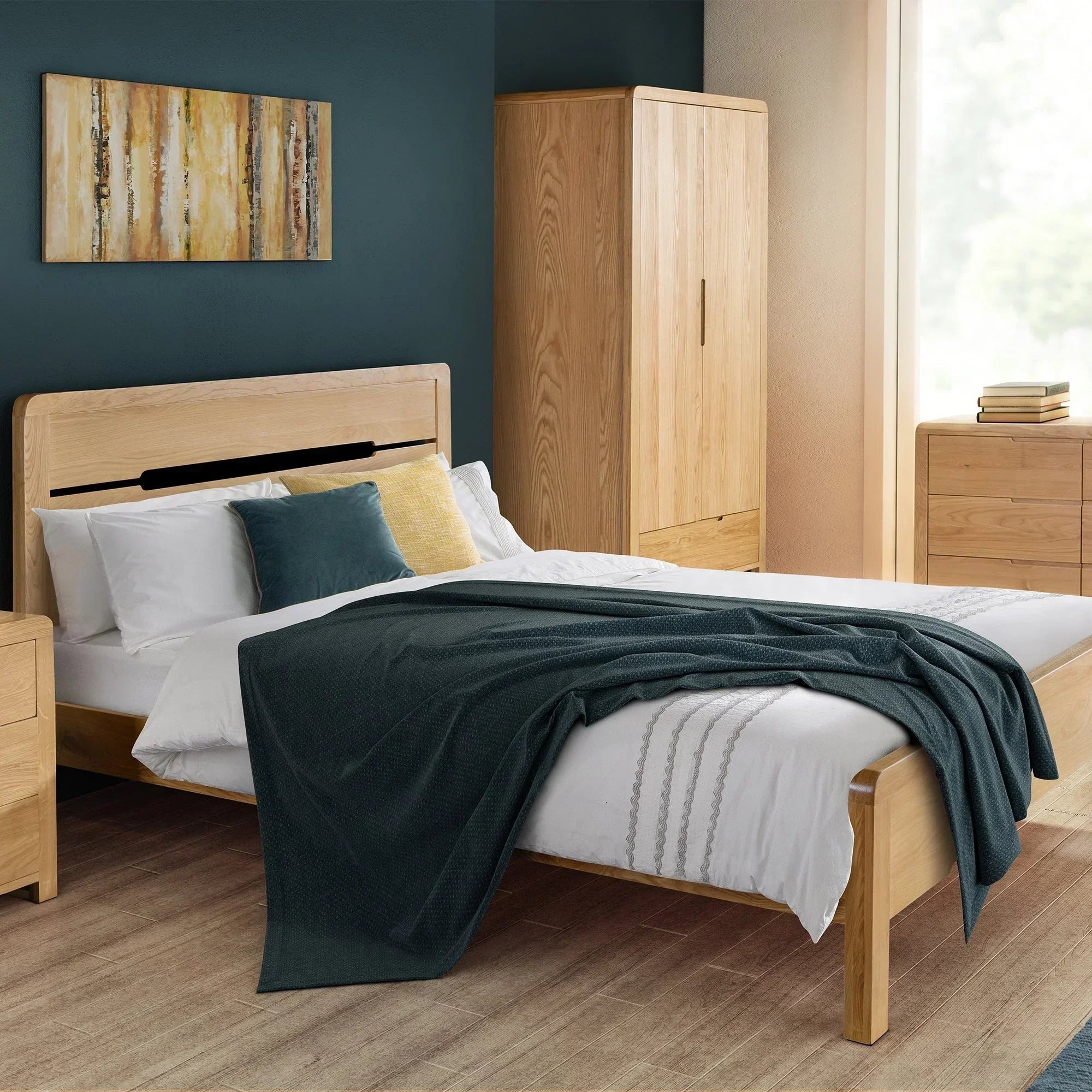Oak double bed with headboard, white bedding and throw blanket in modern bedroom