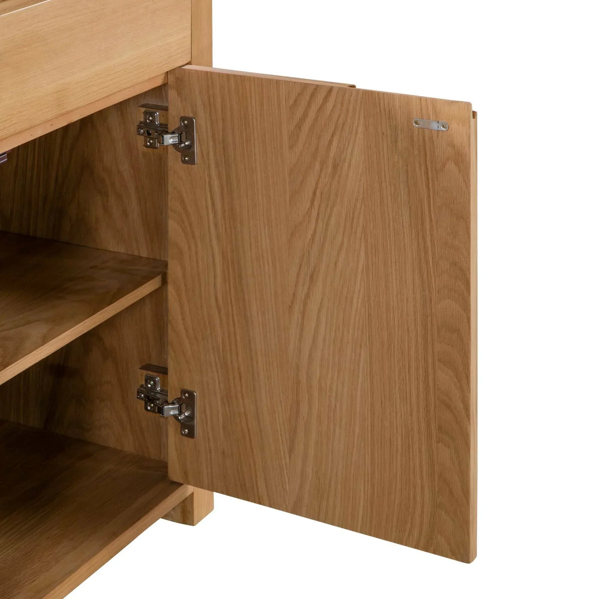 Oak sideboard cabinet door open showing interior shelf and metal hinges