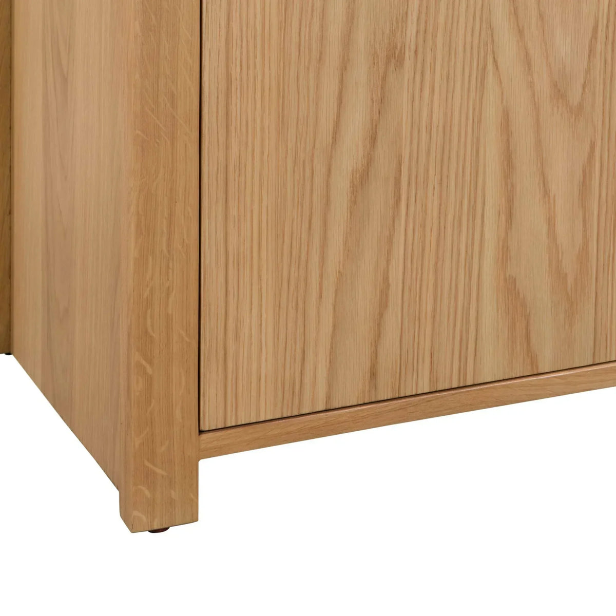 Close-up of oak wood curve sideboard panel highlighting grain and corner detail