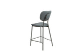 Capri bar stool in midnight blue faux leather with black metal legs, rear angled view