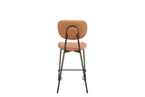 Salmon bar stool with upholstered seat, rounded backrest and black metal legs, rear view