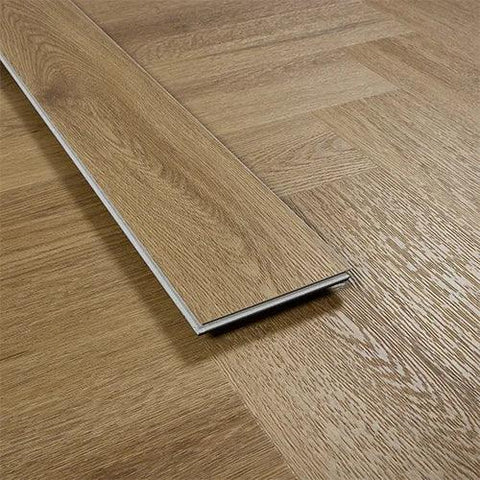 Chestnut effect vinyl plank flooring close-up showing wood grain texture and colour variation