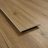 Chestnut wood effect vinyl flooring plank with natural grain pattern and brown tone