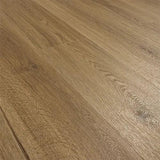 Chestnut wood effect laminate flooring with natural grain detail and warm tone