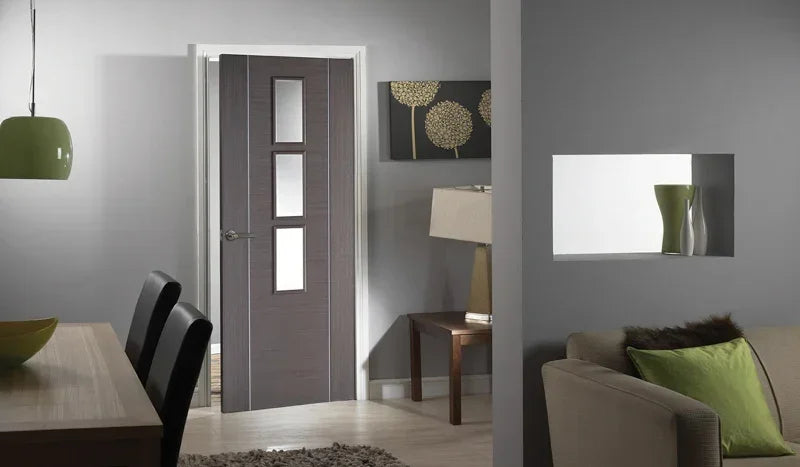 Chocolate grey glazed interior door with three glass panels in modern living room