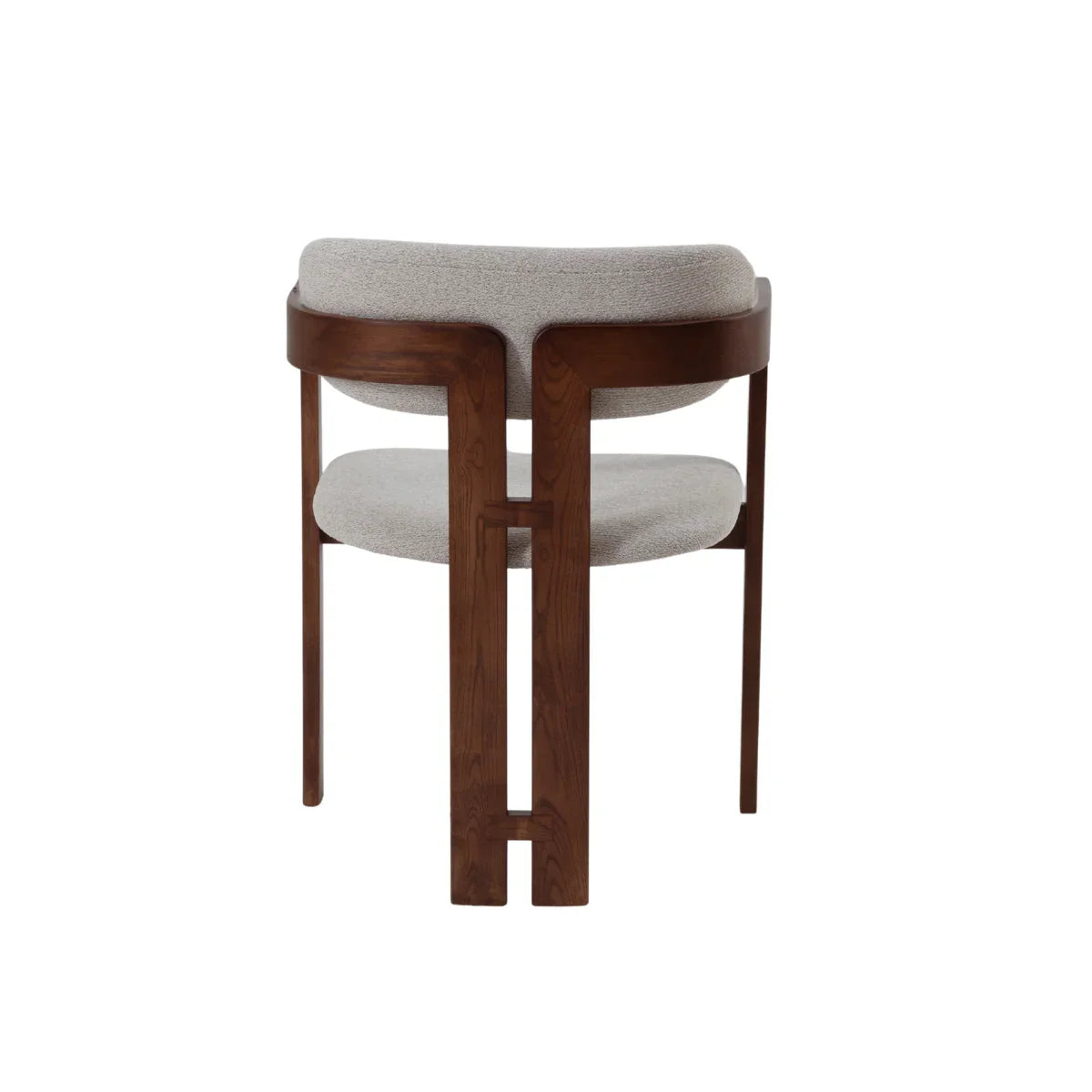 Clara dining chair rear view with curved wood frame and light upholstered seat and back