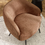 Top view of brown fabric accent chair on white rug showing seat and curved back