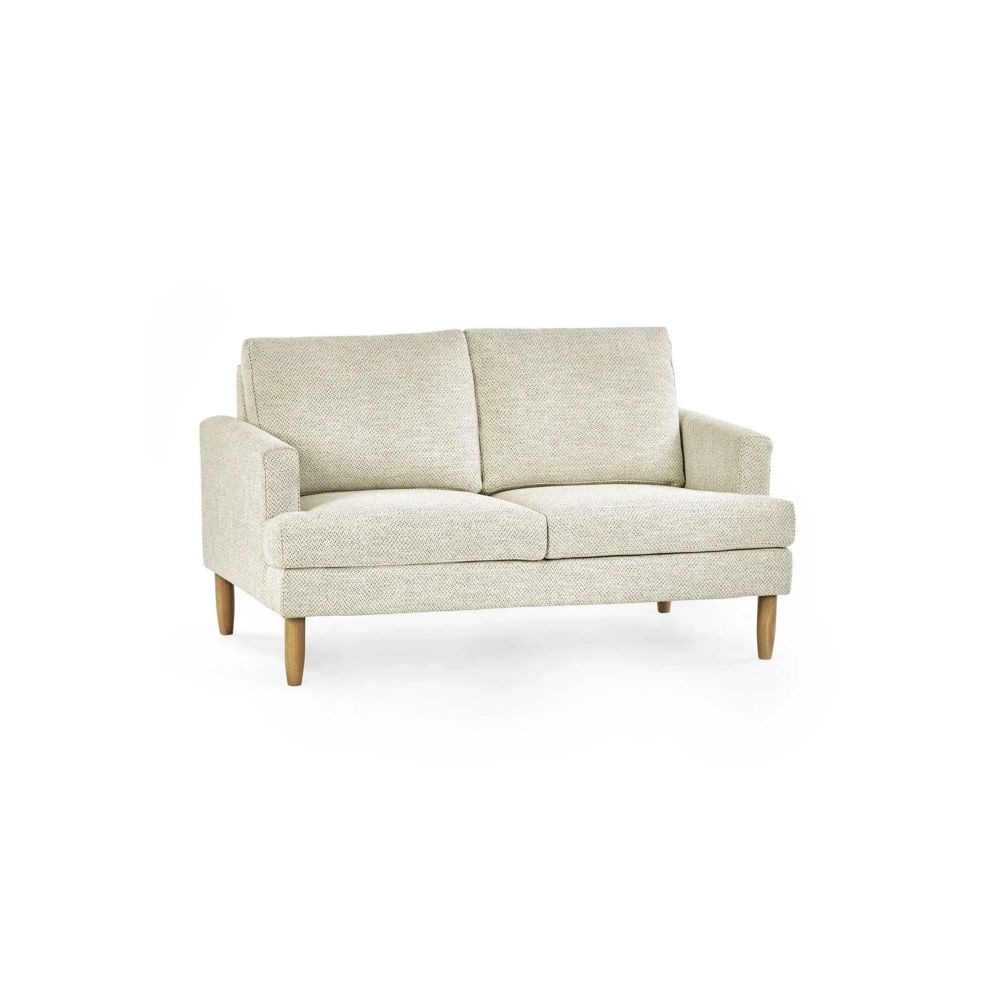 Beige fabric two seater sofa with wooden legs and slim arms on white background