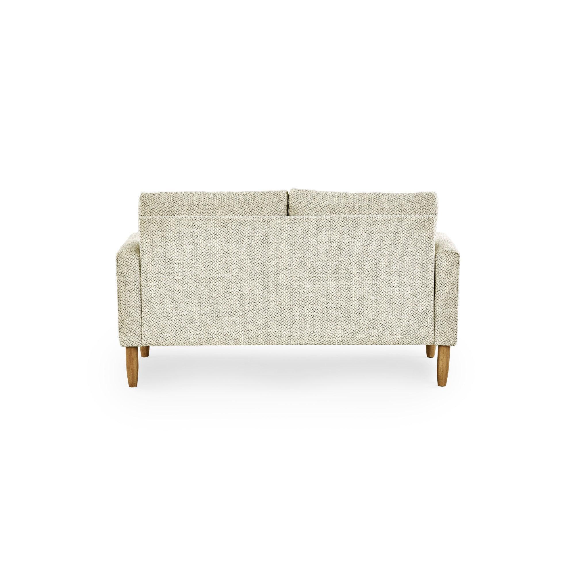 Beige fabric sofa rear view with wooden legs and clean lines