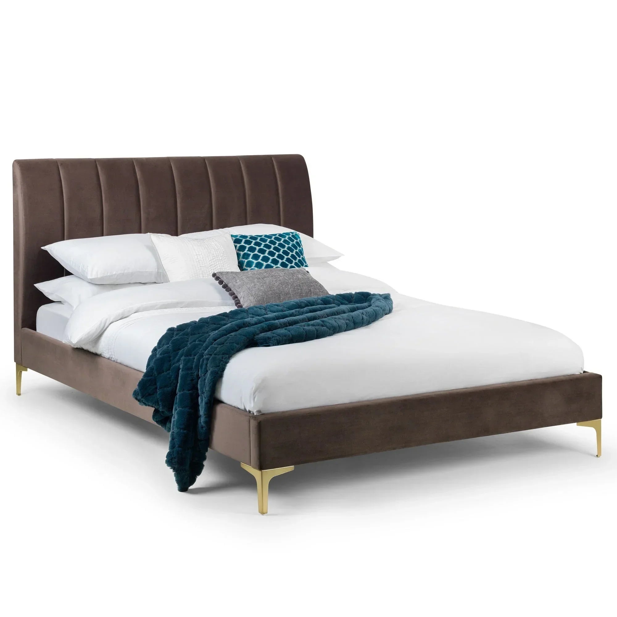 Truffle velvet king bed with vertical panel headboard and gold metal legs, styled with pillows