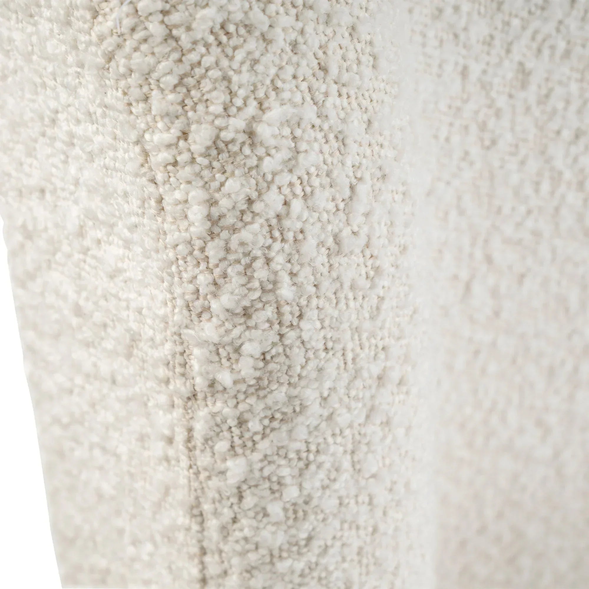 Ivory boucle fabric detail on double bed headboard