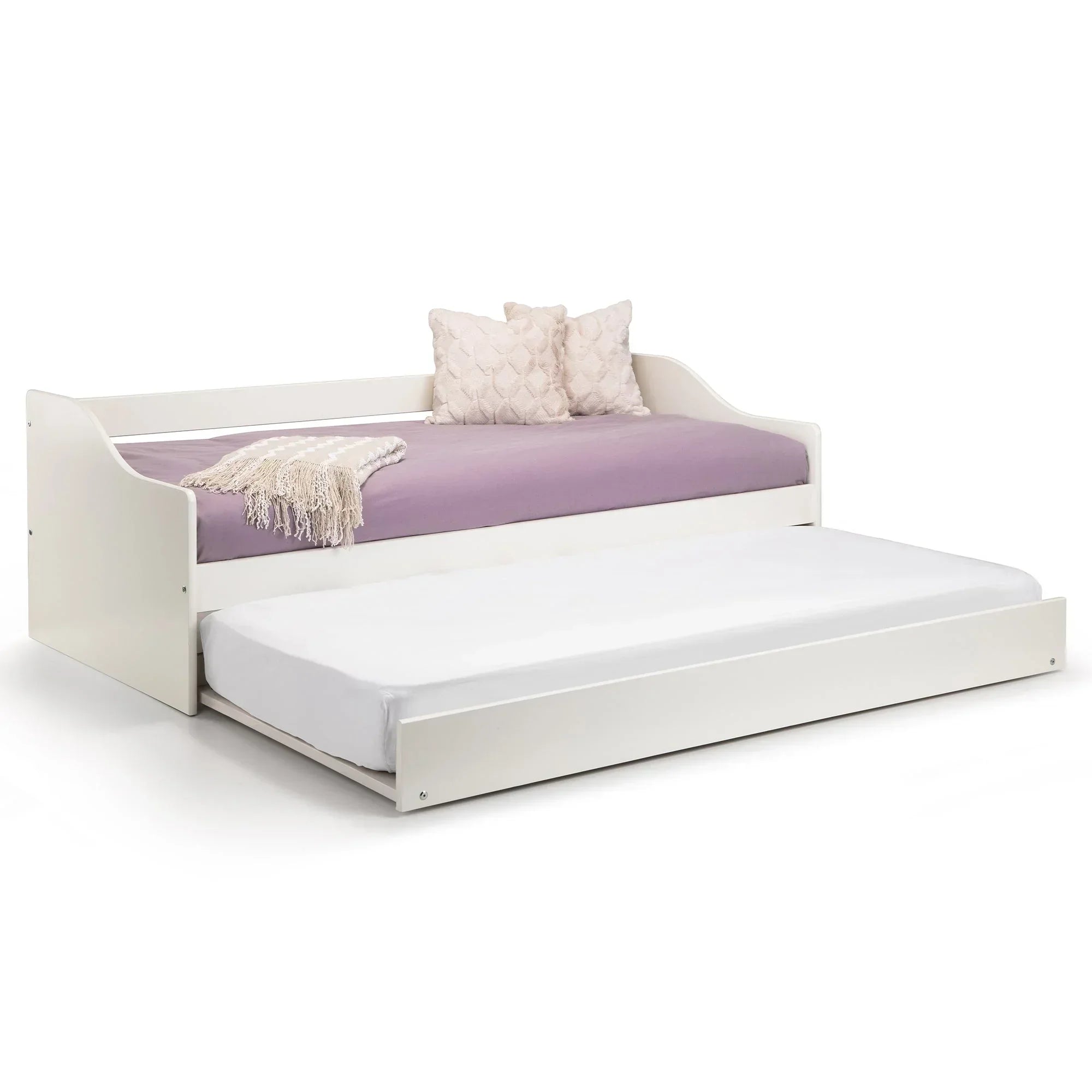 White single daybed with pull-out trundle, lavender bedding, and two textured cushions