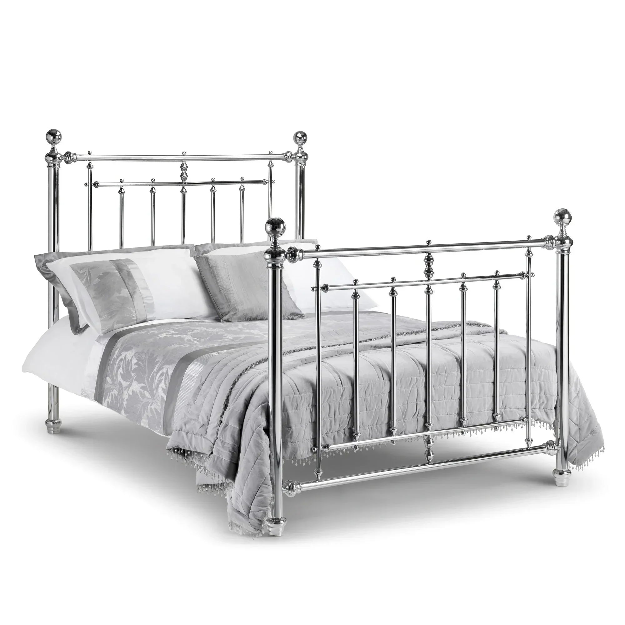 King size chrome metal bed frame with high headboard and footboard, dressed in grey bedding