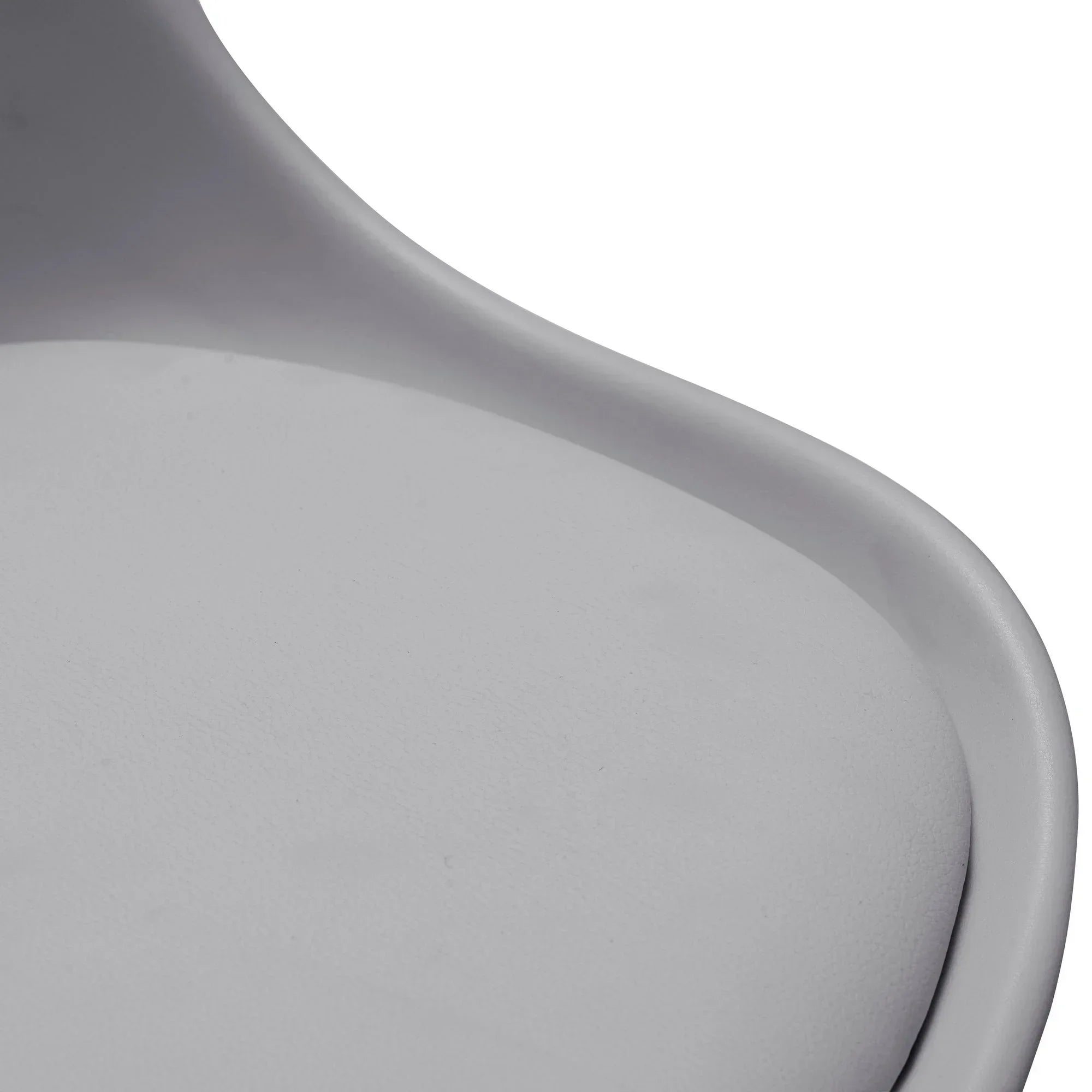 Close view of grey office chair seat cushion and curved backrest