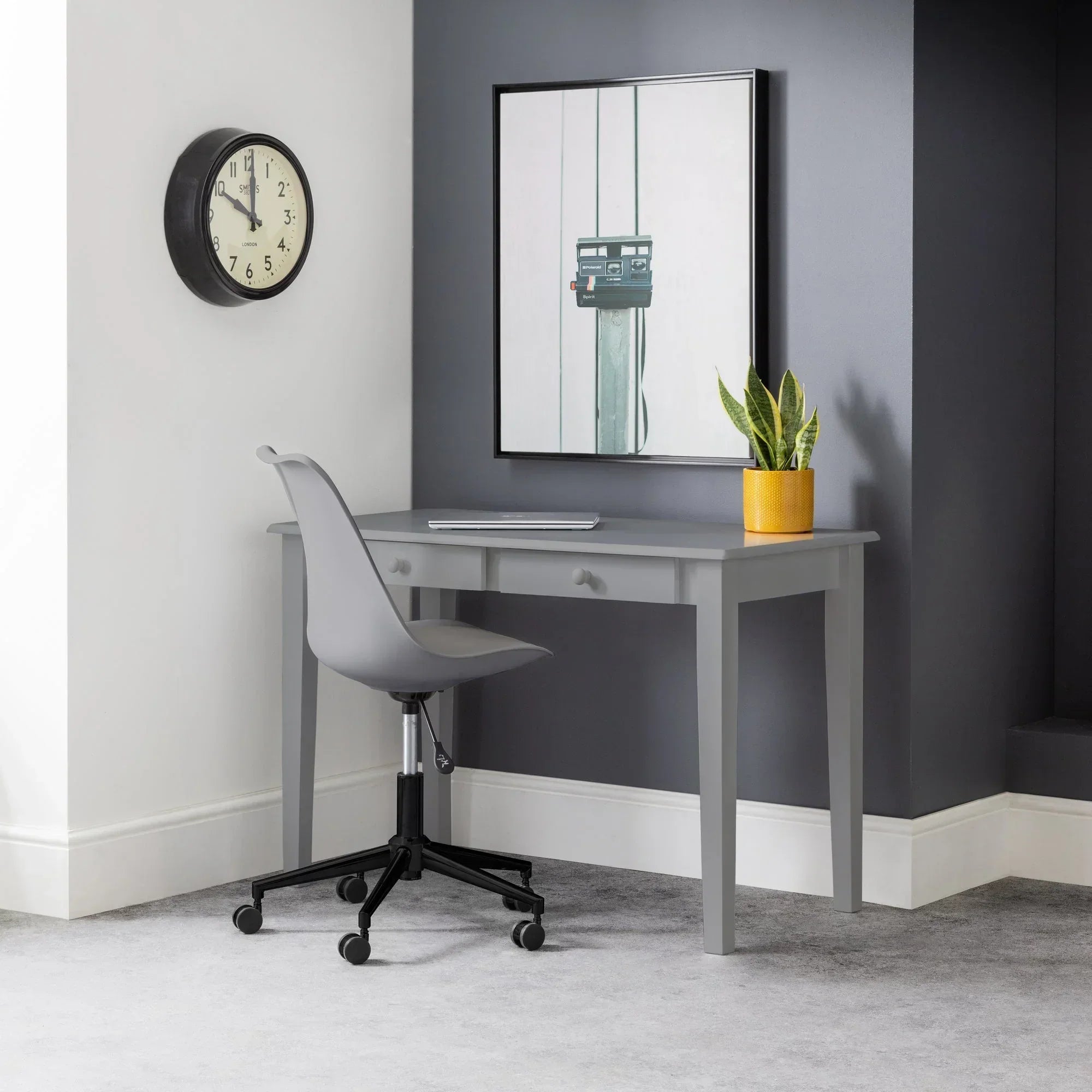 Grey Erika office chair with wheels at grey desk in modern home office corner
