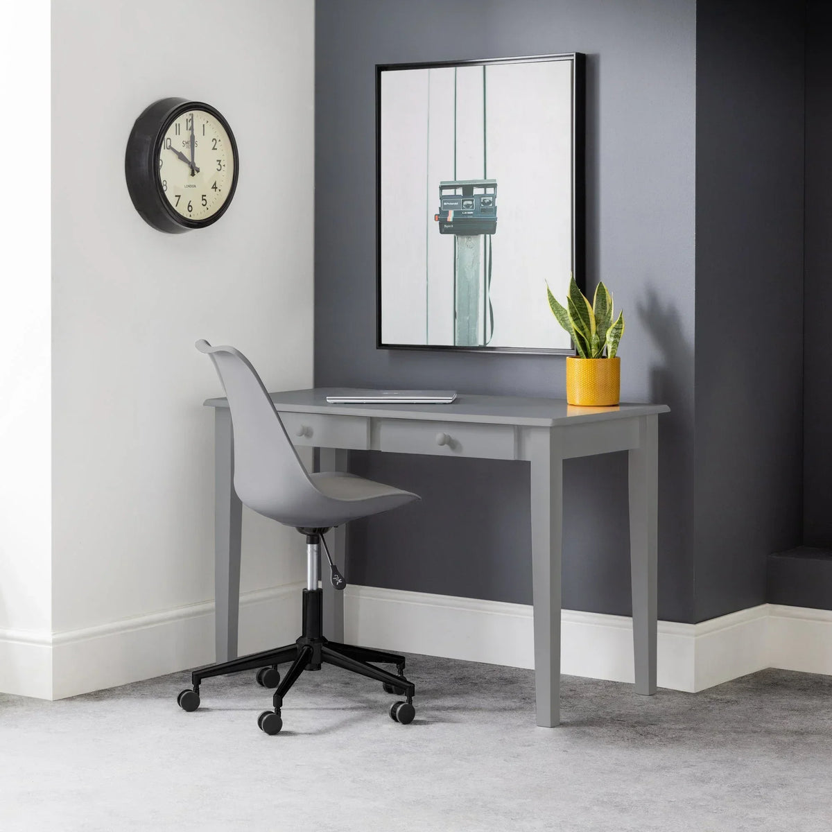 Grey Erika office chair with wheels at grey desk in modern home office corner