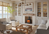 Wood burning stove in a stylish living room setting with a coastal view.