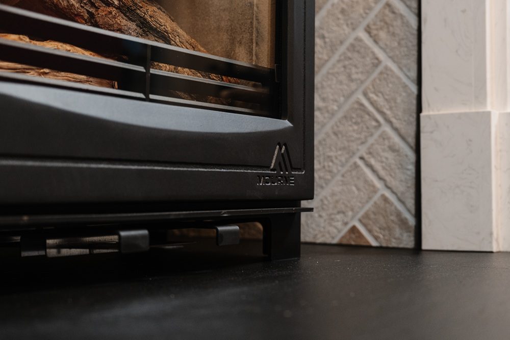 Close-up of Mourne Eco 12 stove showing steel body and door design