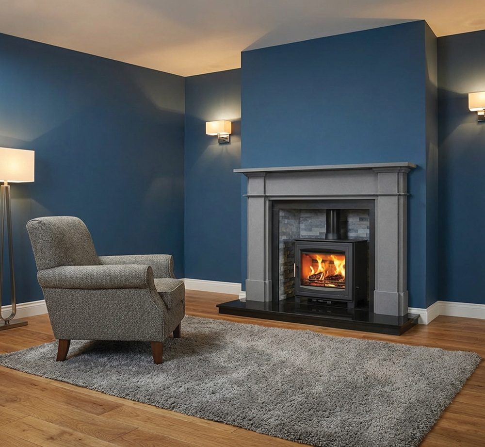 Side view of Mourne Eco 12 stove highlighting flue outlet and dimensions