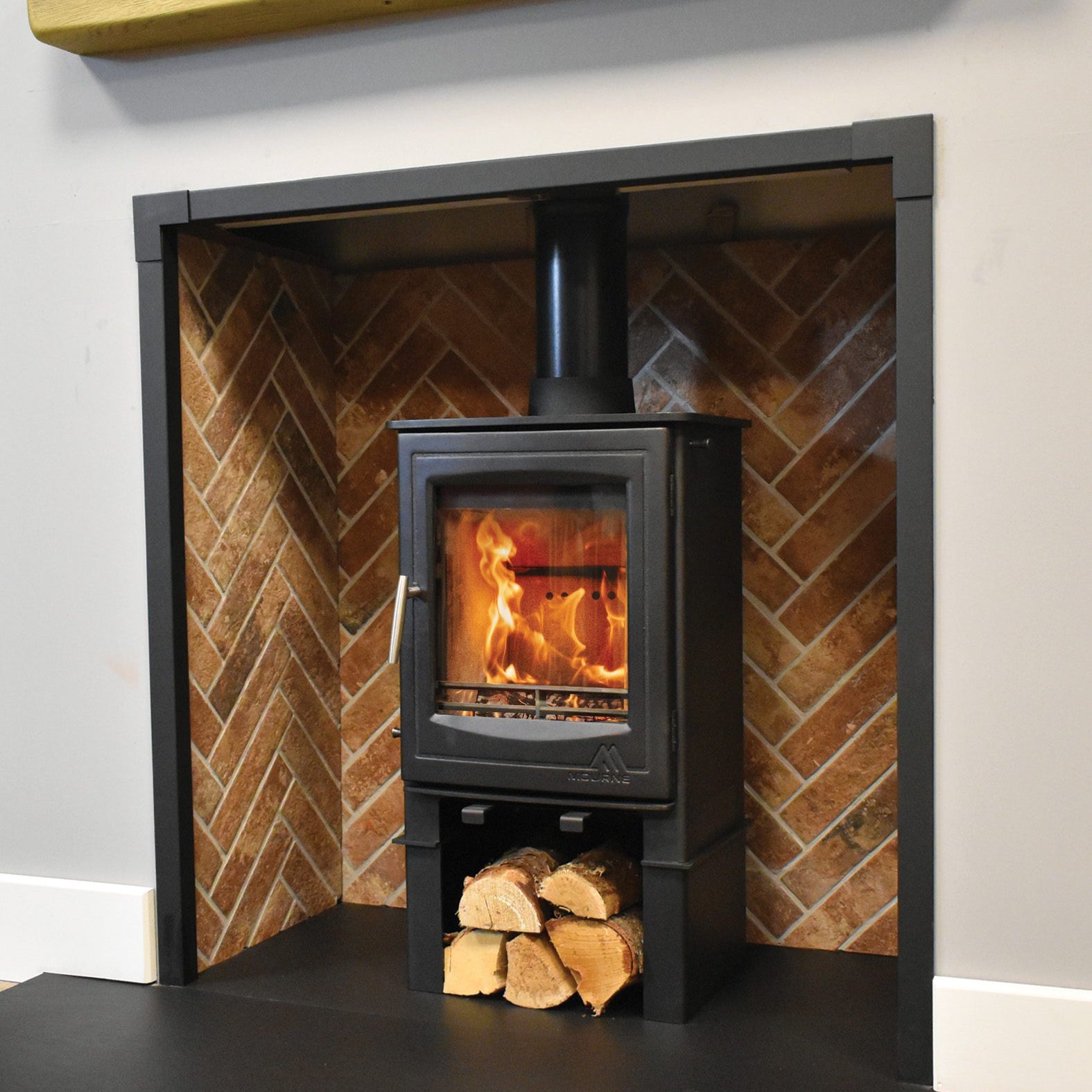 Mourne Eco 5 stove installed in a modern living room setting