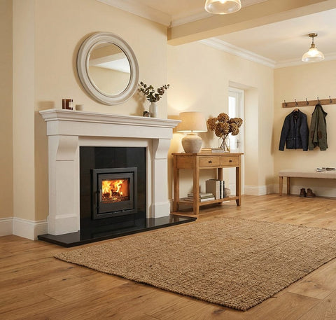 Side view of Mourne Eco Inset 550 multi-fuel stove in living room