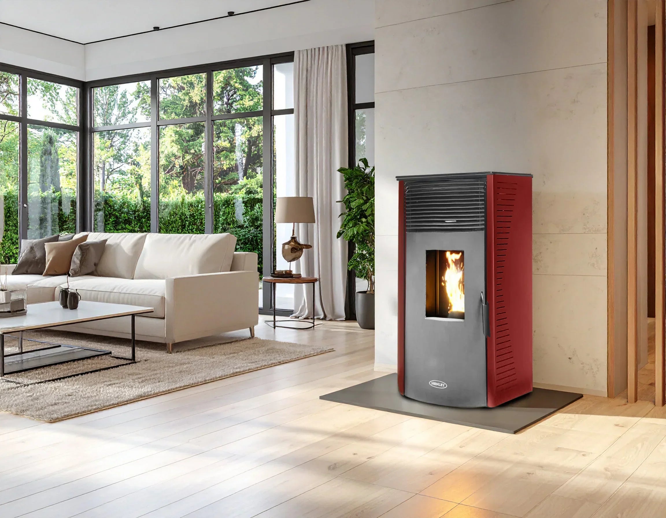 Red freestanding wood burning stove in modern living room with large windows and white sofa