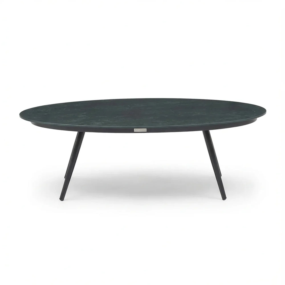 Oval black coffee table with slim metal legs on white background