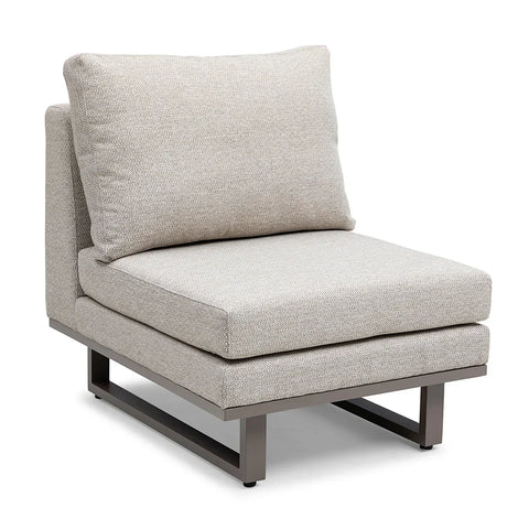 Beige fabric accent chair with metal frame and cushioned seat in side view