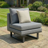Grey garden chair with metal frame and beige cushion on patio
