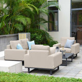 Beige outdoor sofa set with coffee table and cushions on modern patio with plants