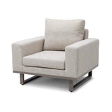 Beige fabric armchair with thick seat cushion, metal base, and wide armrests