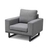 Grey fabric armchair with metal base and wide cushioned arms, front angle view