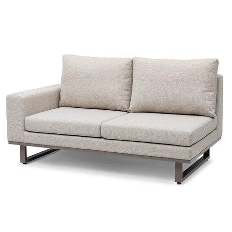 Light beige fabric sofa with metal base and wide armrest, viewed from the front