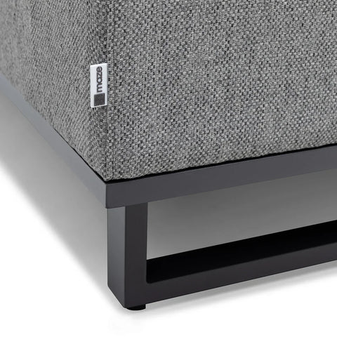 Grey fabric sofa base with black metal legs and textured upholstery detail