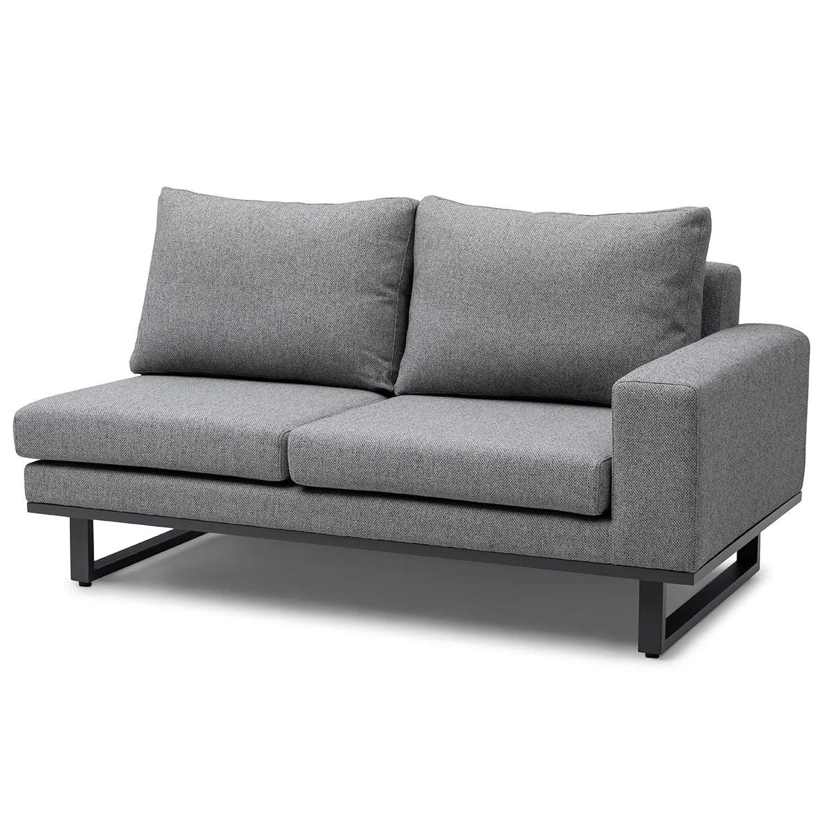 Grey fabric sofa with black metal base and right armrest, front view