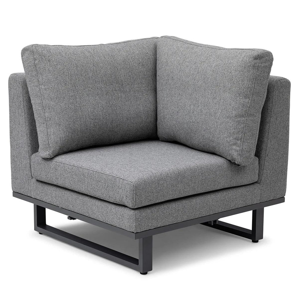 Grey corner sofa chair with metal legs and thick fabric cushions