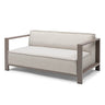 Beige two-seater sofa with metal frame and straight armrests on white background
