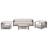 Outdoor furniture set with beige sofa, two armchairs, and square coffee table on white background