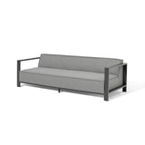 Grey fabric sofa with black metal frame and armrests, modern three-seater design