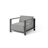 Grey armchair with metal frame and fabric cushions, modern minimalist design, angled view